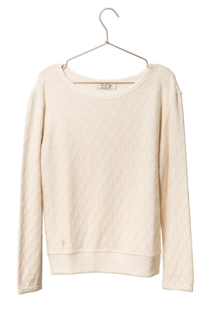 pull féminin coupe droite ajustée, aille en coton ajourée, col rond évasé, manche longue, écru, blanc cassé