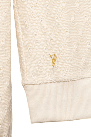 pull féminin coupe droite ajustée, aille en coton ajourée, col rond évasé, manche longue, écru, blanc cassé