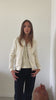 blouson Zippy Suny en velours lisse couleur beurre frais – coupe droite, col rond bomber et zip canon de fusil – Suny